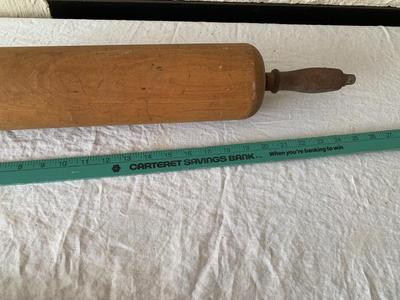 Vintage rolling pins, one really large, the other metal