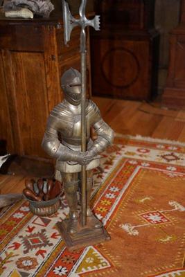 two foot metal knight in armour. 