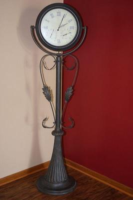 metal floor clock and barometer. Unique. Perfect for the patio or vintage kitchen 