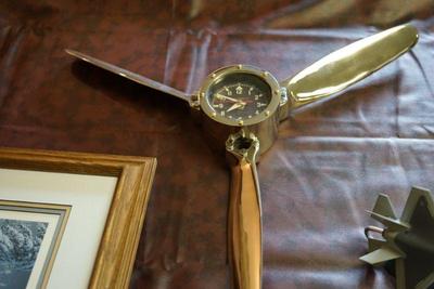Propeller clock of brass