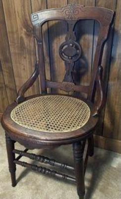 Antique walnut cane bottom chair