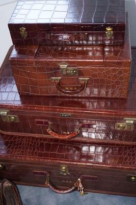 Five piece vintage leather  luggage set . Amelia Earhart tribute design. by I believe a French designer. Must see this impressive set/...