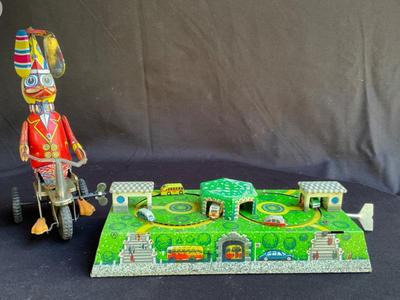Tin Schylling Wind Up Car Track and Wind Up Duck on Bike