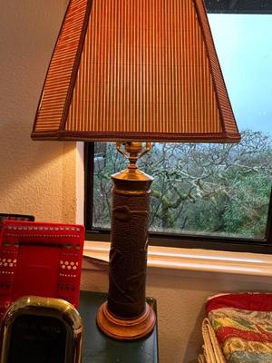 decorated artillery shell made into a lamp base
