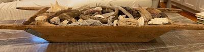 Decorative antique trough filled with large shells and driftwood $250 7x54x16