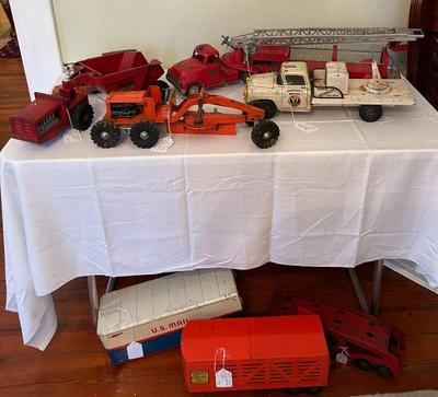 1950's pressed steel trucks, emergency vehicles, farm and construction vehicles.