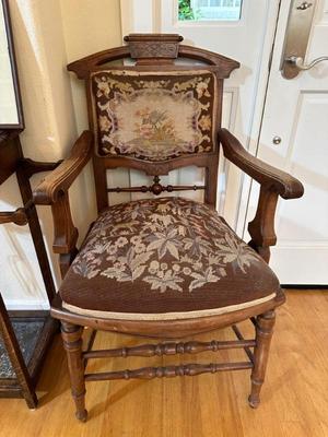 Antique cross stitched armchair