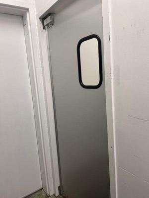 Metal swinging doors