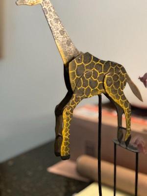 balancing giraffe