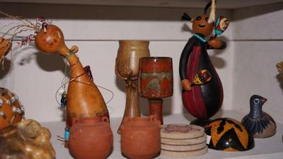 Gourd art .hand painted . also there are gourds for you to decorate in the garage. 