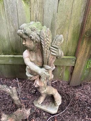 Stone yard statue