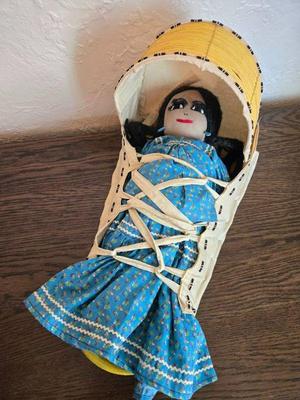 native american doll with back board 