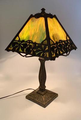 Antique slag glass paneled lamp with brass base