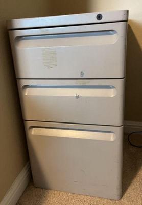 Small beige metal filing cabinet