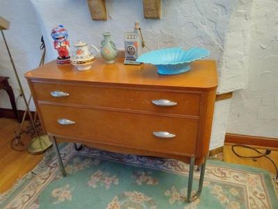 Deco style two drawer chest with bobby pin legs.  Needs some clean up