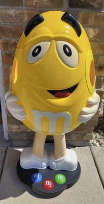 Yellow m m store display