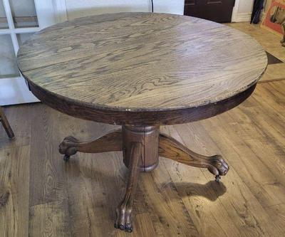 Antique oak empire style round table