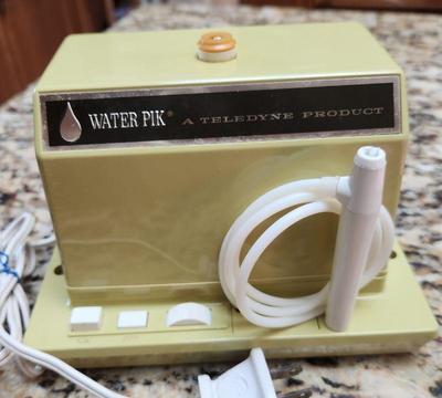 This old Water Pik works like a charm - comes with three attachment heads.