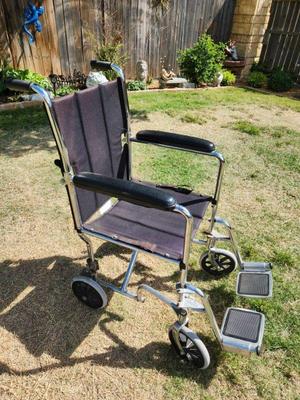 used but in great working condition folding mobility chair
