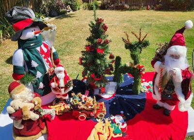 Santas, reindeer and a beautiful tree skirt