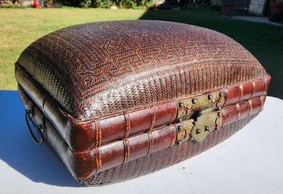 Old wicker and rattan Chinese trunk