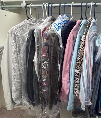 Large selection of very nice (and some new) women's size clothes.  