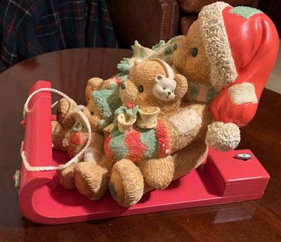 Cherished teddies afamily on toboggana