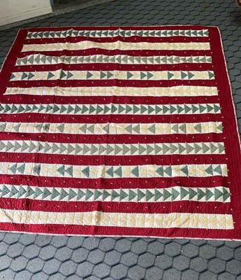 Hand crafted flying geese quilt