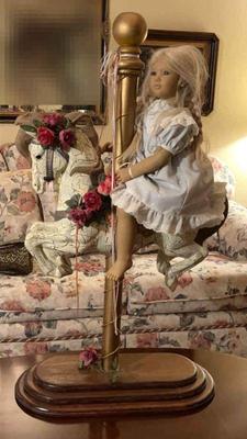 Himstedt porcelain doll on carousel horse