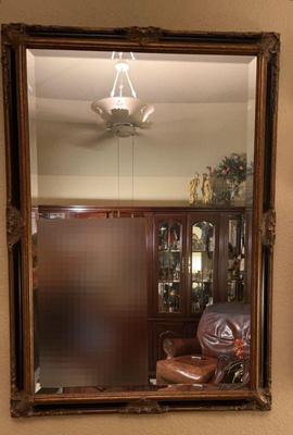 Large gold black framed bevel mirror