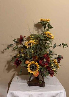 Large sunflowers poppies & pomegranates arrangement