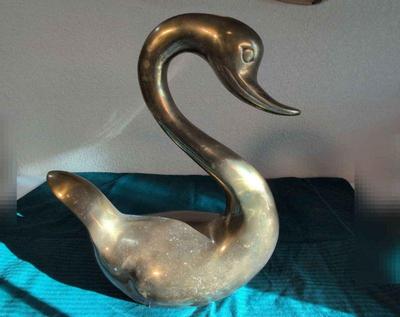 Large brass swan