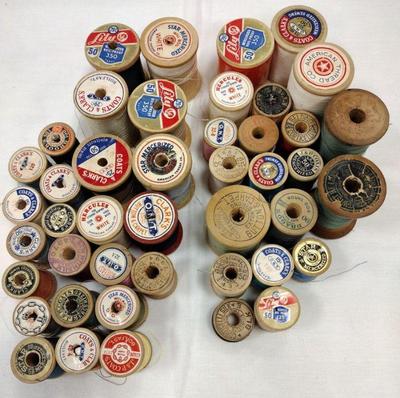 wood spools with thread