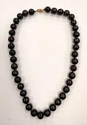 11mm black pearls with clasp marked 14k