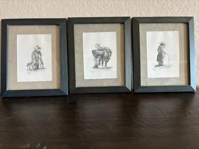 Signed prints of a little cowboy
