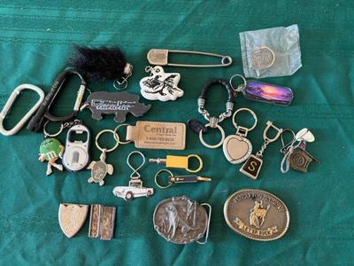 Key chains and belt buckles