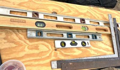 Lot of spirit levels and t squares