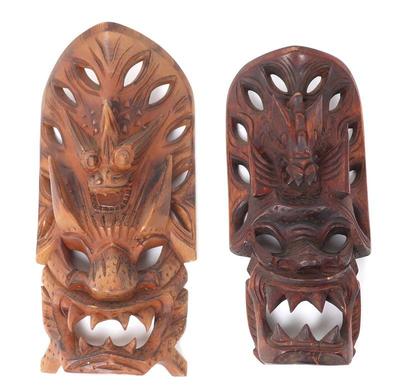 Lot 446 lot of two vintage hand carved filipino dragon masks