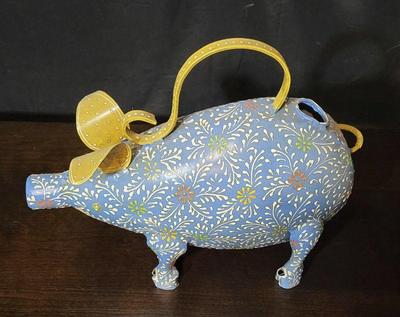 Metal pig watering can