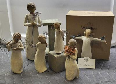 Carved willow tree figures