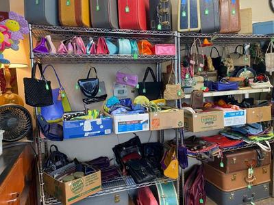 huge collection of vintage suitcases makeup bags, purses