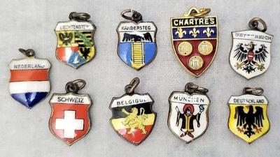 Mb128 travel souvenir northern european shield charms