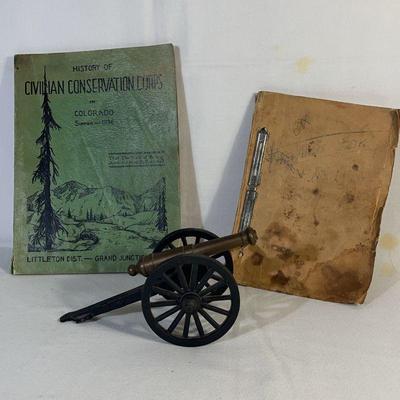 Brass cannon with the army cookbook more