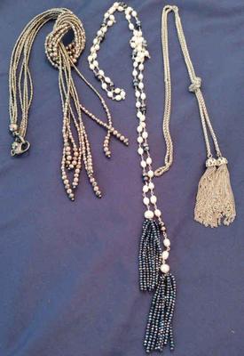 Long necklaces worn wa knot