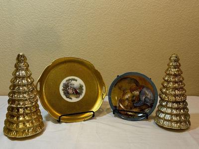 Two golden christmas tree candles more