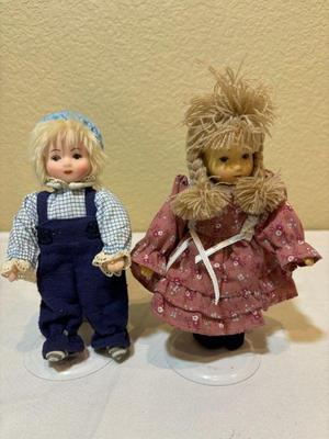 Vintage porcelain tj collection boy and girl dolls