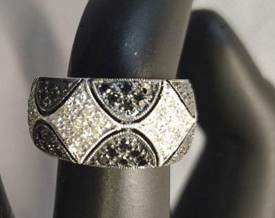 18k ring possibly wblack white diamonds