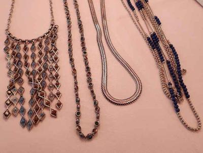 Silver toned long necklaces