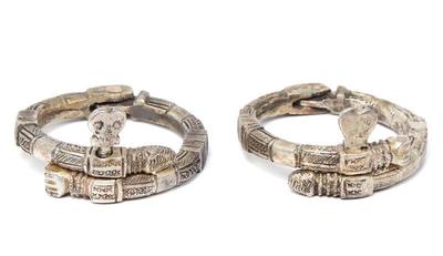 Lot 144 pair of african silver two piece bracelets