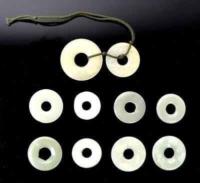Lot 119 collection of ten chinese white jade bi disc 36g